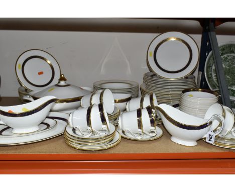 A ROYAL DOULTON 'HARLOW' PATTERN DINNER SET, comprising two gravy jugs, one stand, an oval meat plate (marked as second quali