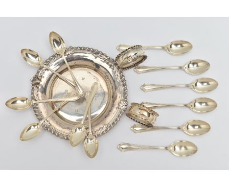 A SELECTION OF SILVER ITEMS, to include a round tray, with shell detail and gadrooned rim, hallmarked to the centre 'Roberts 