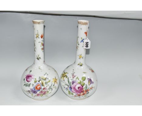 A PAIR OF PFVA DRESDEN STYLE ONION SHAPED VASES HAND PAINTED WITH DEUTCHE BLUMEN, gilt rims, painted marks to the bases of bo