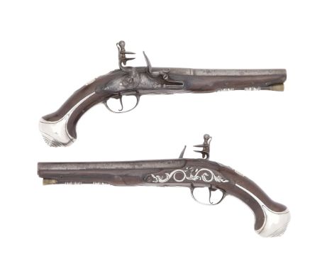 A Pair Of 20-Bore Flintlock Silver-Mounted Holster PistolsBy T. Gregory Of London, Circa 1720-30With russet two-stage barrels