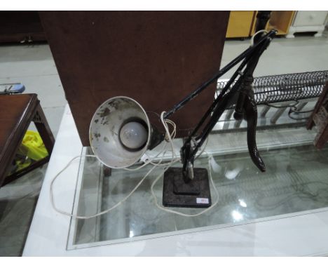 A vintage angle poise lamp