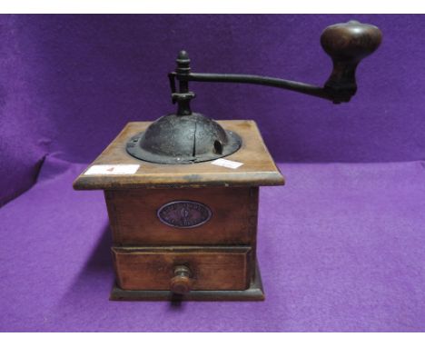 A vintage kitchen coffee grinder by Mutzig Framont 