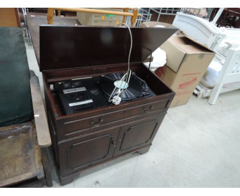 A vintage period style gramophone cabinet with integral speaker systemNot tested