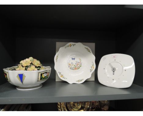 A selection of ceramics including wall clock
