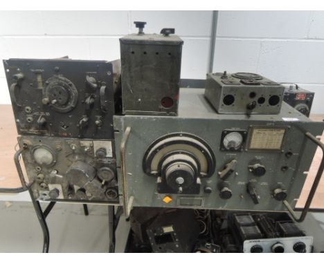 A selection of military aviation and communication devices and radio parts 