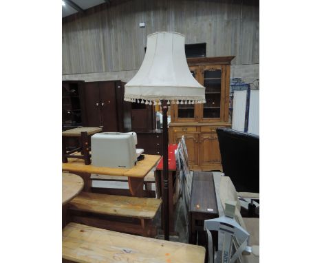 A traditional mahogany standard lamp