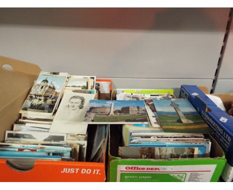 Two boxes of assorted postcards to include scenic, architectural etc 