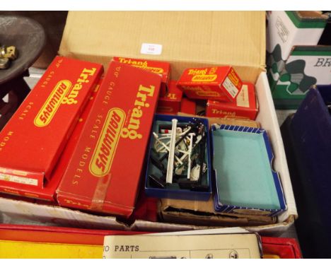 A box of assorted Triang and Hornby Dublo 'OO' gauge models and track to include points, fish van, gate keepers hut etc, most