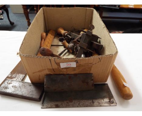 A selection of vintage tools to include gauges, square, braddles, clamps, screwdrivers, chisels etc