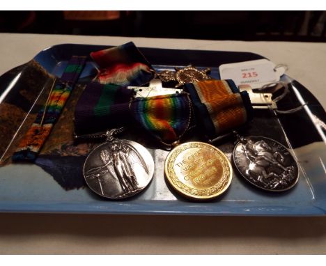 A WWI family medal group comprised of 1914-15 Star, Great War medal and Victory medal trio awarded to 830 PTE W.J. Foxwell E.