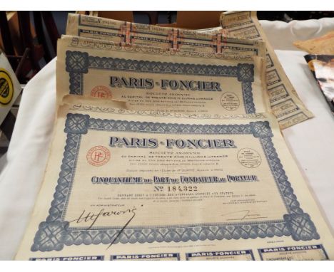 A quantity of 1920s Paris-Foncier share certificates and coupons