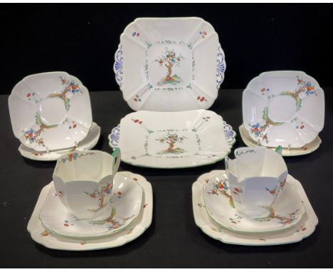 A Shelley ‘Crabtree’ part tea service comprised of; a pair of picnic plates, two tea cups, saucers, side plates; etc 