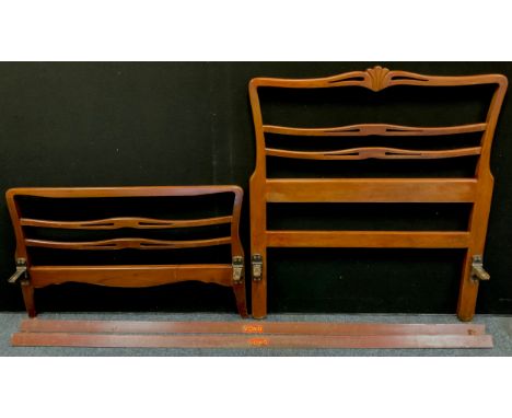 A single mahogany bed frame, c.1960;  and a mahogany double bed headboard, (2). 