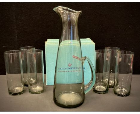 A mid 20th century Danish Kastrup- Holmegaard smoke glass lemonade set, tapering jug and six glasses, part boxed. 