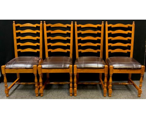 A set of four oak ladder-back dining chairs, 105cm high x 48cm wide, (4). 