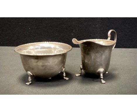 A George VI silver milk jug and sugar bowl, Northern Goldsmiths Co, Birmingham 1941, 3.67ozt (2) 