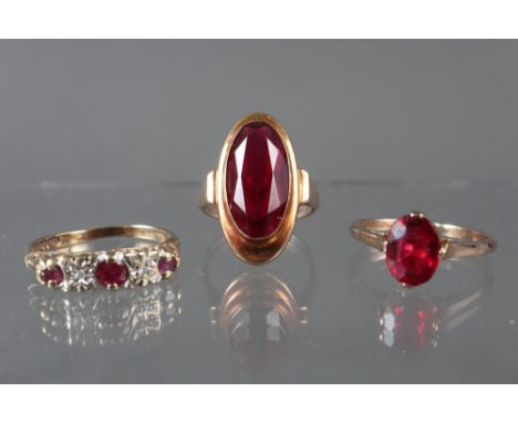A 9ct gold, diamond and ruby five-stone dress ring, size O/P, 2.5g, a 9ct gold and garnet single stone ring, size I, 3.5g and