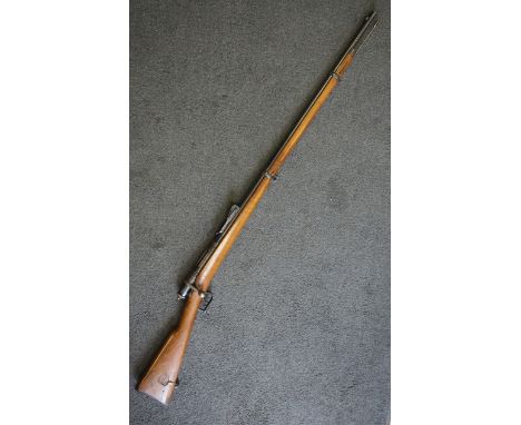 A Vitterli-Vitali 1881-87 rifle with walnut stock and associated cleaning tools, in leather presentation case, barrel 33 1/2"