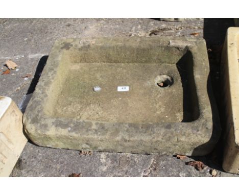 A carved stone rectangular garden sink, 22" wide x 16" deep