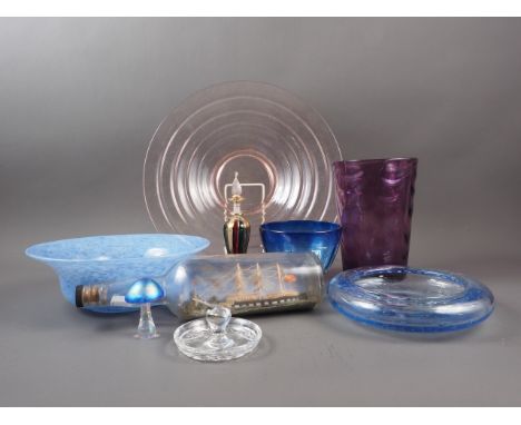 A pink coloured glass tapered bowl, 14" dia, a light blue coloured art glass bowl, a smaller similar bowl, a purple glass vas