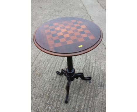A 19th century rosewood and satinwood inlaid chess table, on turned column and tripod splay support, 20" dia x 27" high