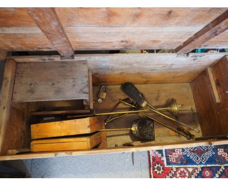 A pine tool chest and a set of brass fire implements 