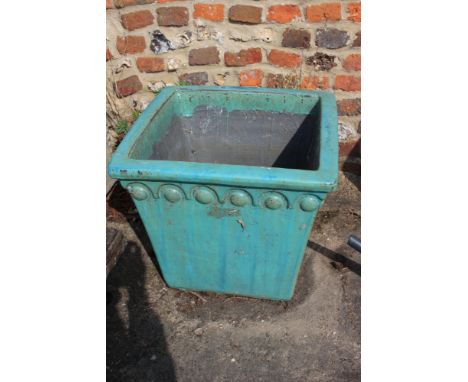 A blue glazed stoneware tapered planter, 17 1/2" dia x 17" high, and a pair of blue glazed bulbous plant pots