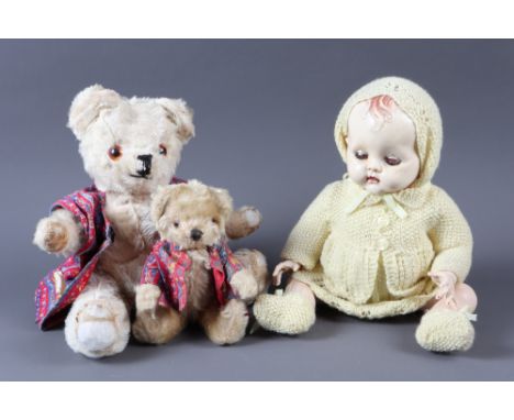 A plush teddy bear, "Ted", 13" high, a smaller teddy ,"Ted 2", 8" high, a mid 20th the century composition doll, "Henrietta",