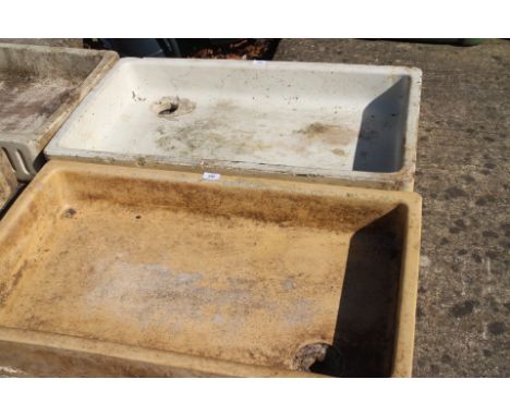 A cream glazed rectangular cream sink, 35" wide x 19" deep x 6" high, and a similar white glazed rectangular garden sink, 35 