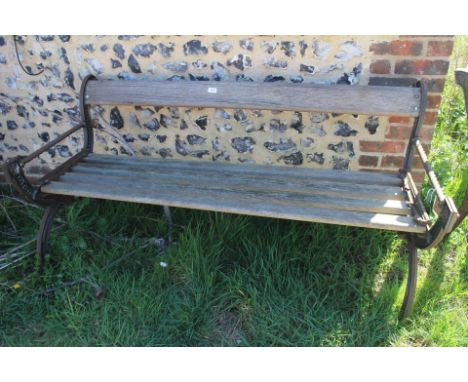 An Aesthetic design cast iron garden bench with slatted seat, 60" wide