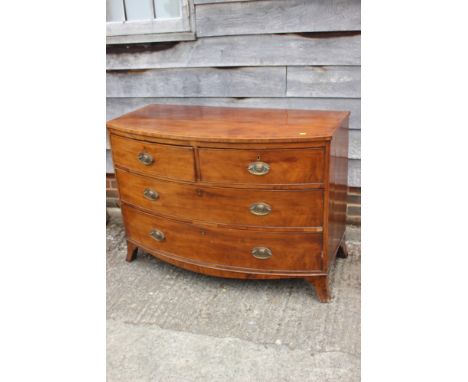A 19th century mahogany and line inlaid bowfront chest of two short and two long drawers, on splay bracket supports, 46" wide