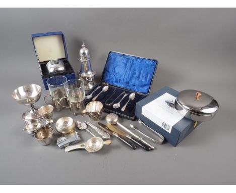 A white metal embossed cup, stamped 925, 2oz troy approx, a plated tumbler cup, in fitted case, various other plated items, a