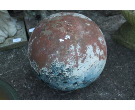 A painted terracotta spherical finial, 12" dia approx