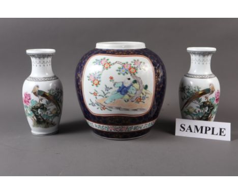 A Chinese ginger jar with panelled figure and floral decoration on a dark blue glazed and gilt floral design ground, 8 3/4" h