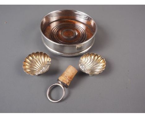 A pair of silver salts formed as shells, 0.5oz troy approx, a cork and silver topped bottle stopper, and a Mappin &amp; Webb 