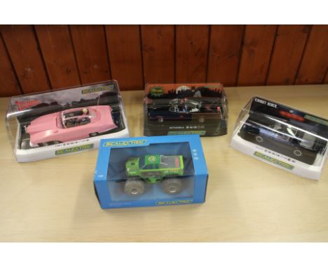 A Scalextric Batmobile, Fab-1, Knight Rider and a Monster Truck "Rattler"