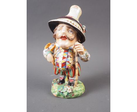 A Derby Mansion House dwarf, 6 1/2" highCondition:We believe the figure to be 18th century.The foliage on his head has been r