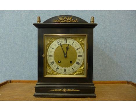 A late 19th Century German Lenzkirch ebonised and parcel gilt bracket clock, the dial signed by retailers  Ollivant &amp; Bot