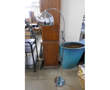 A chrome floor standing arc lamp 