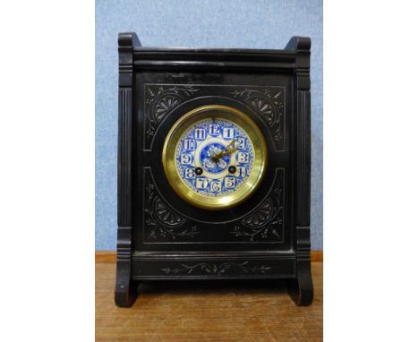 A Victorian Aesthetic Movement ebonised bracket clock 