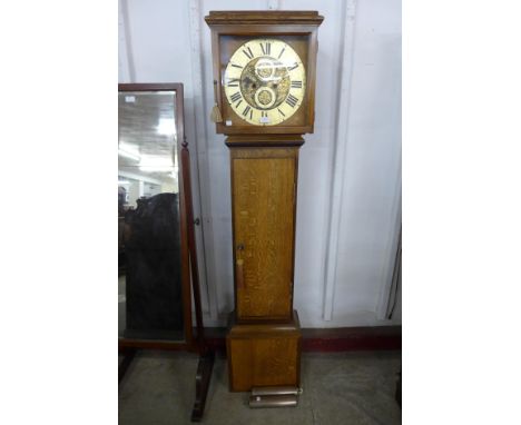 An oak 8-day longcase clock 
