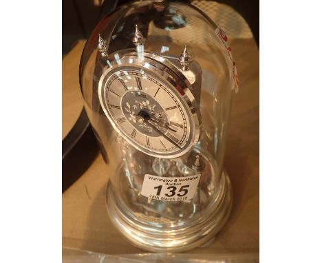 Swarovski anniversary chrome effect quartz movement clock CONDITION REPORT: This item is plastic and is none chiming.
