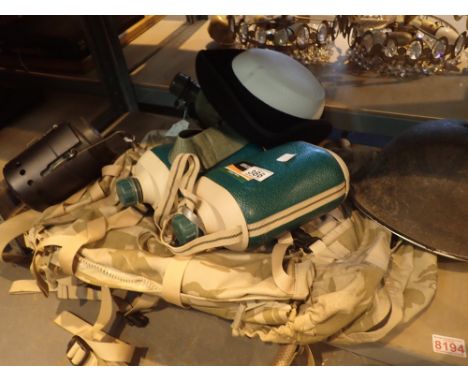 Assorted military items including helmet water bottles holdall etc