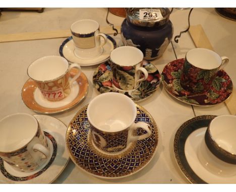 Seven Wedgwood coffee cups and saucers