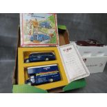 TWO BOXED DANBURY MINT 1964 ASTON MARTIN DB5 1:24 SCALE, together with a Corgi 'We're on The Move'