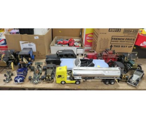 THIRTEEN MAINLY LARGE SCALE UNBOXED VEHICLES, to include tin plate taxi, tin plate fire engine, 2002 MGA, New Ray Shell artic