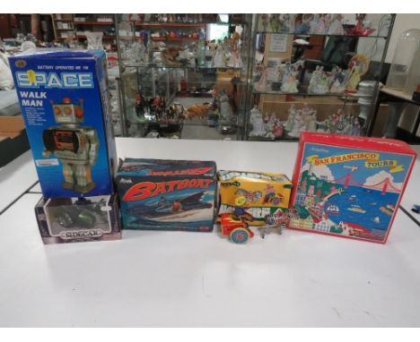 A SELECTION OF TOYS TO INCLUDE VINTAGE POLAR LIGHTS 1:25 SCALE BATBOAT, Homme Marchantde Space Walk Man Robot, Schylling tin 