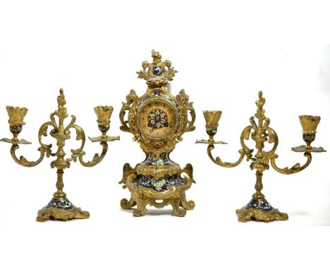 Gilt metal clock garniture with enamel decoration