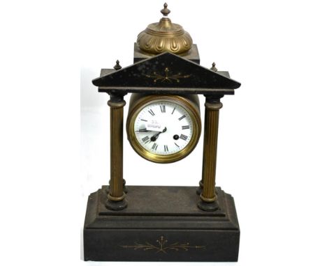 A 19th/20th century gilt metal and slate striking portico clock of architectural form