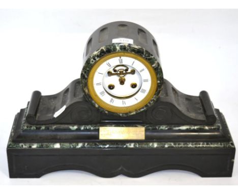 A variegated marble and slate striking mantel clock, the skeletal dial and enamel chapter ring with Roman numerals and with p
